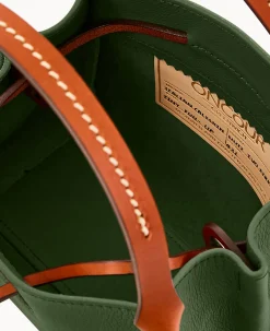 Dooney & Bourke Ready For the Getaway|Textured Leather<Oncour Twist Tiny Full Up Grass