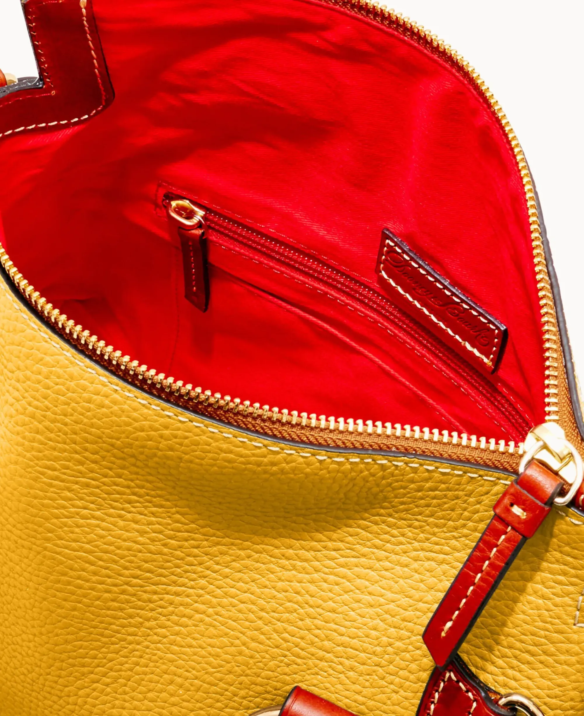 Dooney & Bourke The Pebble Grain Collection|Ready For the Getaway<Pebble Grain Satchel Mustard